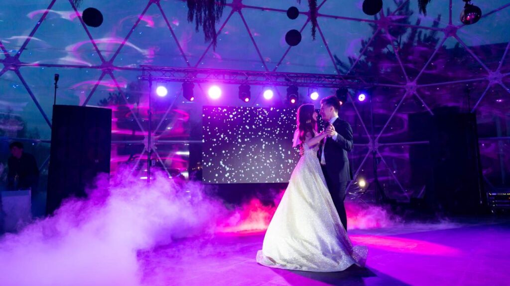 Bride and groom dancing with fireworks wedding entertainment